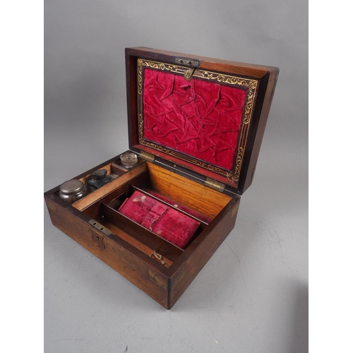 160 - A 19th century rosewood workbox with part fitted interior, 12