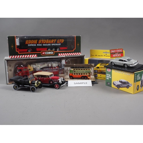 193 - Three Corgi Classics fire engines, a Routemaster bus, an Eddie Stobart DAF 95 articulated lorry and ... 