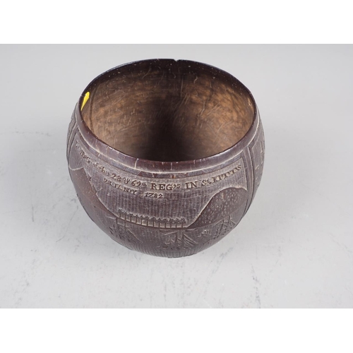 209 - An 18th century carved coconut cup, commemorating Sir G E Rodney's breaking of the French line 12 Ap... 