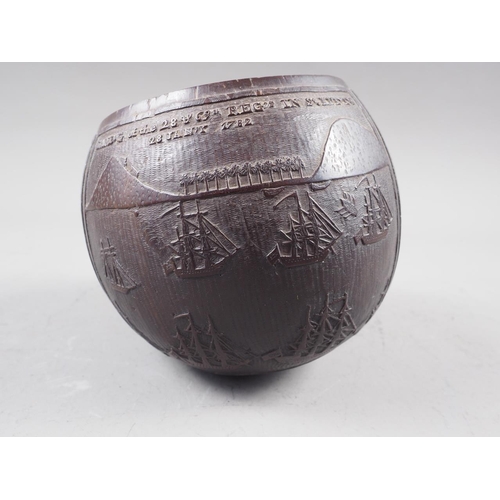 209 - An 18th century carved coconut cup, commemorating Sir G E Rodney's breaking of the French line 12 Ap... 