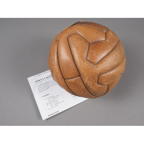 216 - A 1930 leather football, said to have been used at the FA Cup final at Wembley, Arsenal versus Hudde... 