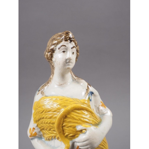 22 - An 18th century Pratt type figure of Ceres, on sponge work decorated base, 8 3/4