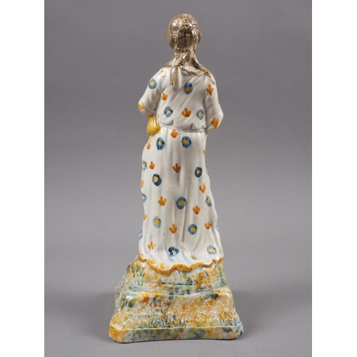 22 - An 18th century Pratt type figure of Ceres, on sponge work decorated base, 8 3/4