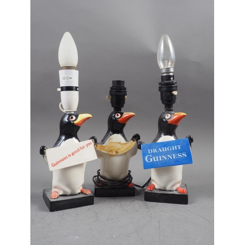 255 - Three Carltonware Guinness Penguin advertising table lamps, 9 1/2