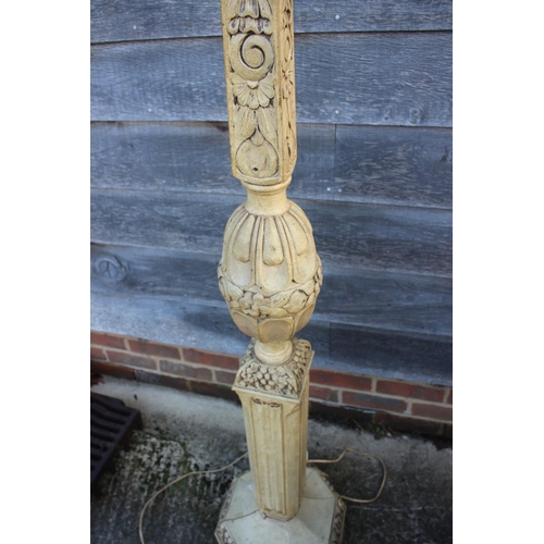 263 - A 1930s painted and grained carved hardwood standard lamp, on octagonal base, 64