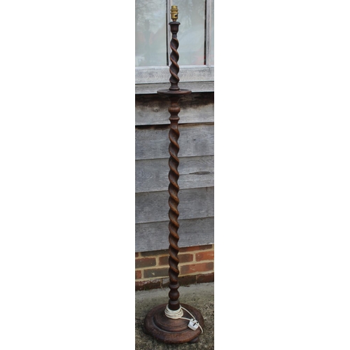 271 - A carved mahogany standard lamp, on tripod splay supports, and two other standard lamps