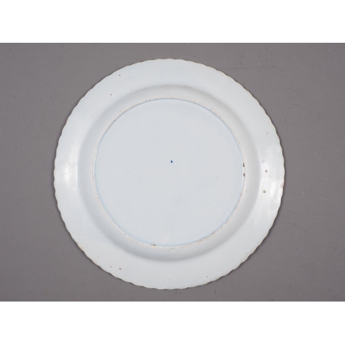 30 - An early 19th century blue and white decorated plate, 