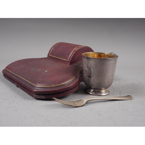 315 - A Garrard's engine turned silver christening mug and matching fork, in fitted case, 7.5oz troy appro... 