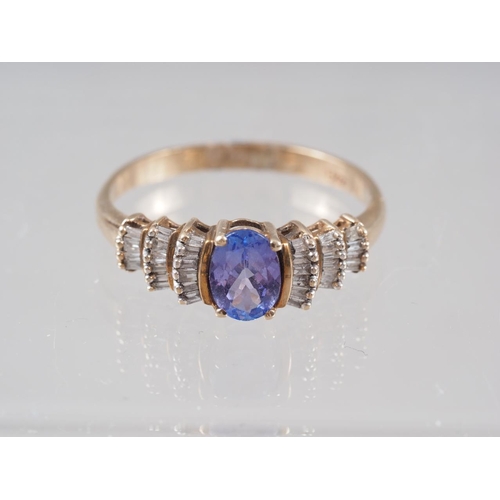 328 - A 9ct gold, diamond and tanzanite dress ring, size S, 2.3g