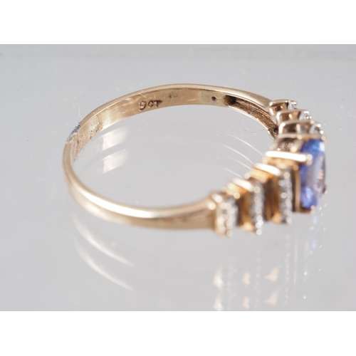 328 - A 9ct gold, diamond and tanzanite dress ring, size S, 2.3g