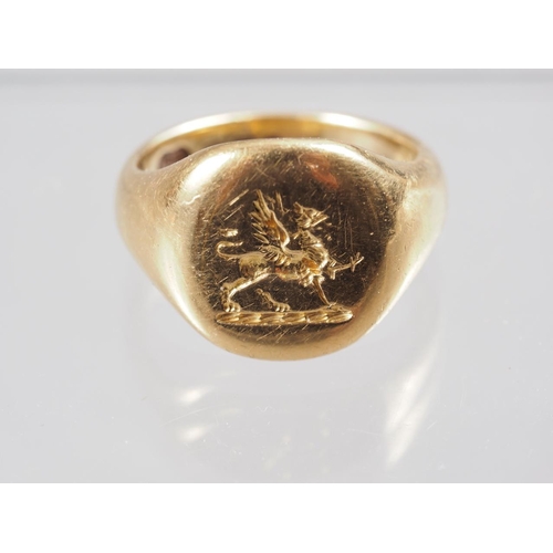 332 - An 18ct gold signet ring, size J, 9.2g