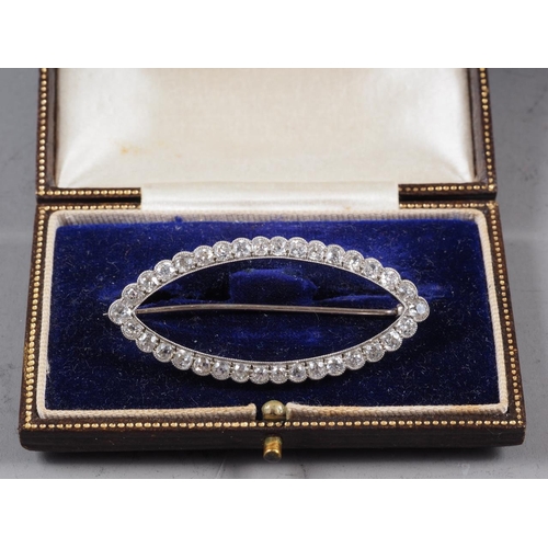 335 - A white metal and diamond navette-shaped brooch, thirty-four old cut diamonds, 49mm wide overall, 5.... 