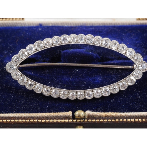 335 - A white metal and diamond navette-shaped brooch, thirty-four old cut diamonds, 49mm wide overall, 5.... 