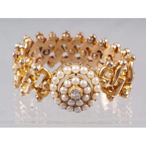 336 - A 15ct gold, pearl and diamond set expanding bracelet, 21g