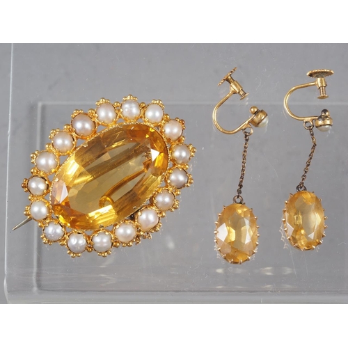 340 - A yellow metal, pearl and citrine brooch, and a similar pair of yellow metal and citrine drop earrin... 