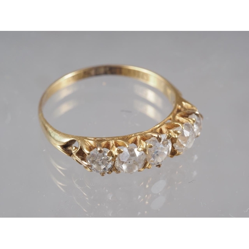 344 - An 18ct gold and diamond five stone dress ring, size Q, 2.6g