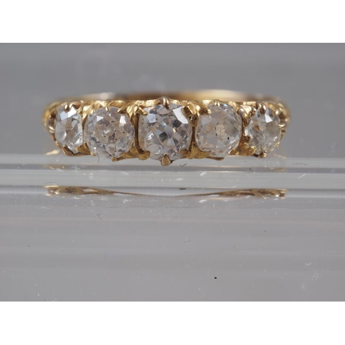 344 - An 18ct gold and diamond five stone dress ring, size Q, 2.6g