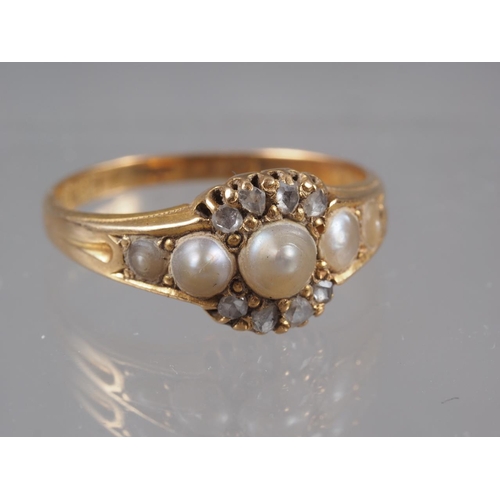 345 - An 18ct gold,  pearl and  diamond dress ring, size O, 3.3g... 