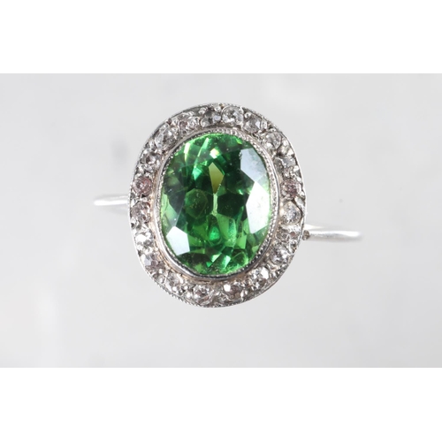 358 - A white metal ring, set demantoid garnet, 2ct approx, and rose diamond collar