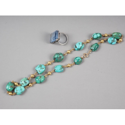 360 - A 9ct gold and turquoise pebble necklace and a silver and synthetic spinel ring