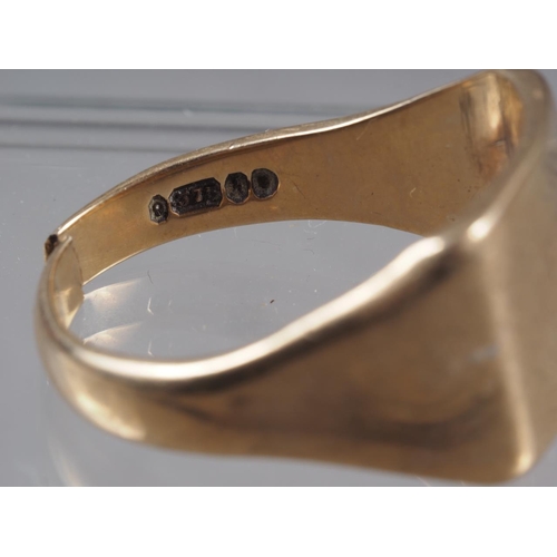 377 - A 9ct gold signet ring (band split), 9.6g