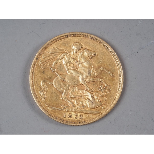 380 - A Victorian sovereign, 1876, in gilt sovereign case