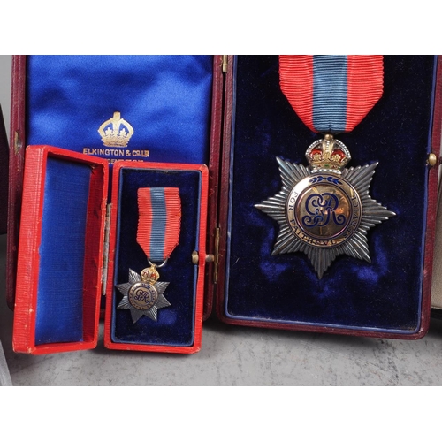 381 - An Imperial Service Order, in fitted box, a matching miniature, a group of WWII medals, various othe... 