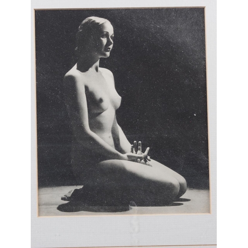 388 - A black and white print of a 1930s nude, in ebonised frame