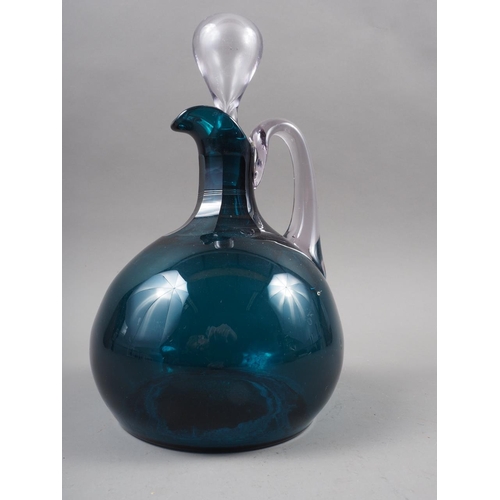 41 - A 19th century green glass jug and stopper, a similar jug and stopper and a Whitefriars type reprodu... 