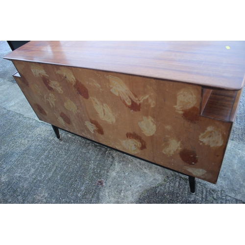 495 - A 1950s G Plan Librenza teak sideboard, fitted three drawers over two bi-fold doors, on ebonised spl... 