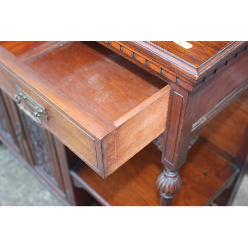 501 - An Edwardian walnut dresser, the upper section fitted three mirror panels and glazed cupboard, over ... 