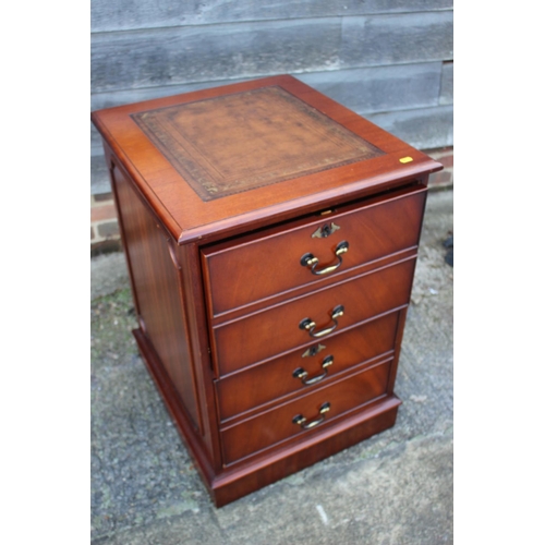 503 - A mahogany two-drawer filing cabinet with tooled leather lined top, 21