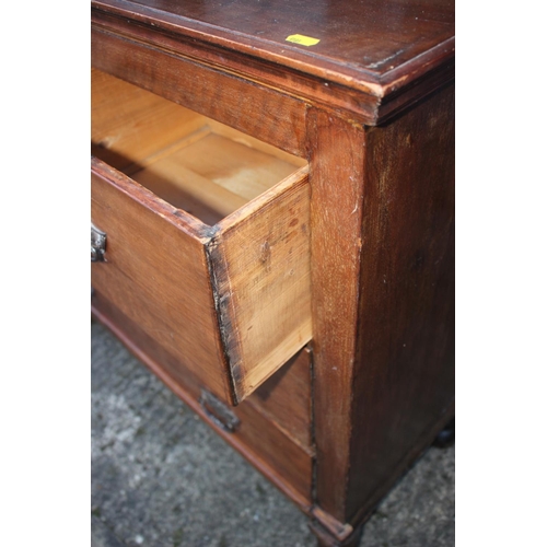 506 - A 1920s polished as walnut dressing chest, fitted mirror and two jewel drawers, over two small and t... 