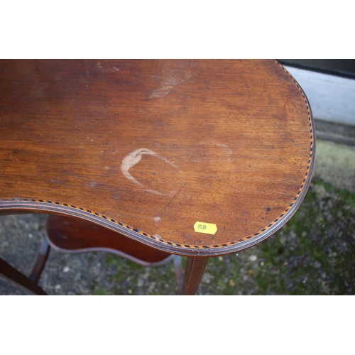 516 - An Edwardian mahogany box and ebony strung kidney-shape two-tier occasional table, on splay supports... 