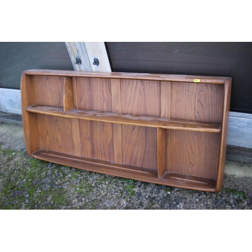 520 - A 1960s Ercol elm 268 plate rack, 42