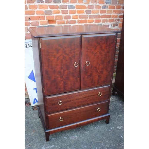 528 - A Stag Minstrel two-door wardrobe, fitted one drawer, on bracket feet, 38