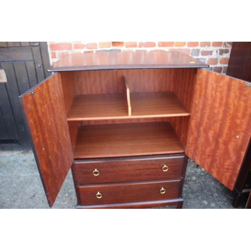 528 - A Stag Minstrel two-door wardrobe, fitted one drawer, on bracket feet, 38