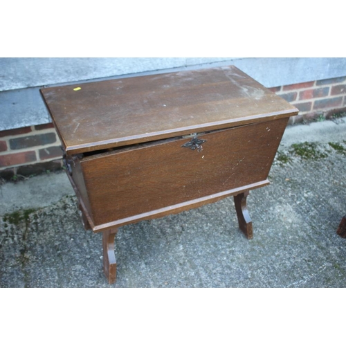 535 - An oak dough bin/sewing box with fitted interior, on panel end supports, 31