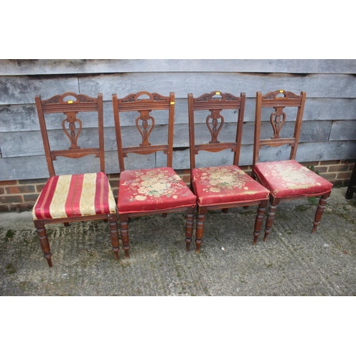 539 - A set of four Edwardian walnut standing dining chairs and a 1930s low seat fireside chair with pierc... 