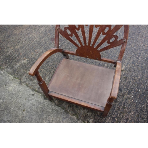 539 - A set of four Edwardian walnut standing dining chairs and a 1930s low seat fireside chair with pierc... 