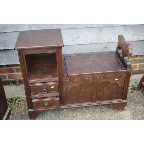 540 - An oak telephone seat, fitted two drawers, 36