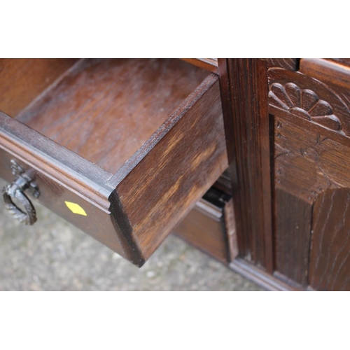 540 - An oak telephone seat, fitted two drawers, 36