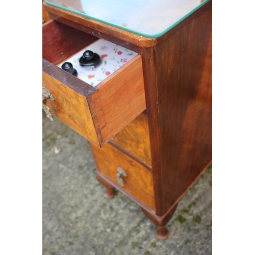 542 - A 1930s walnut inverse breakfront dressing table, fitted one long and six small drawers, on cabriole... 