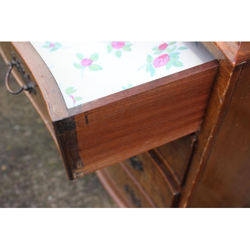 545 - A near pair of burr walnut and banded serpentine front chest of four long drawers, each 31