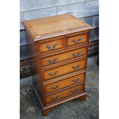 546 - A mahogany and banded chest of two short and three long drawers, on bracket feet, 19