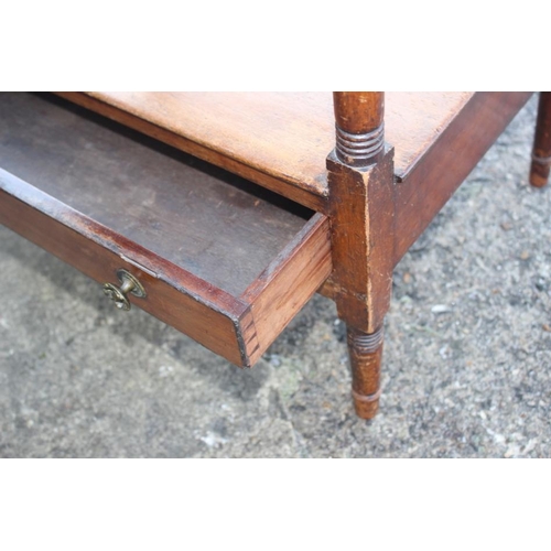 547 - A mahogany two-tier occasional table, fitted one drawer, on turned supports, 25