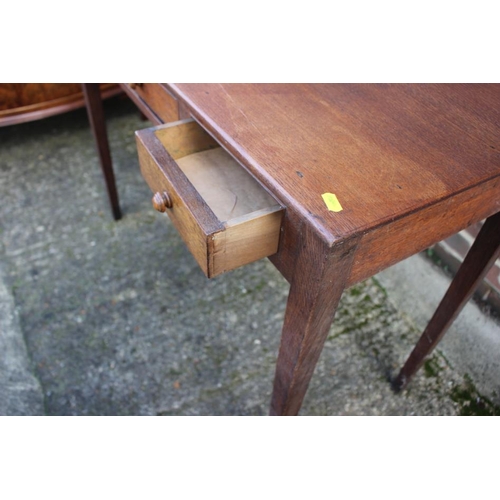 552 - An Edwardian oak side table, fitted three drawers, on square taper supports, 37 1/2