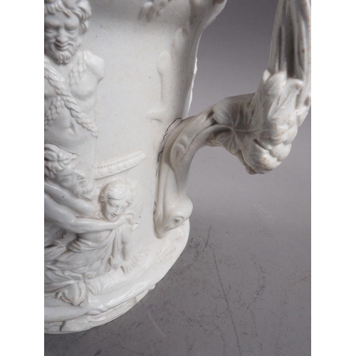 79 - A Charles Meigh 19th century relief moulded jug with Bacchus and Silenus decoration, 10 1/4