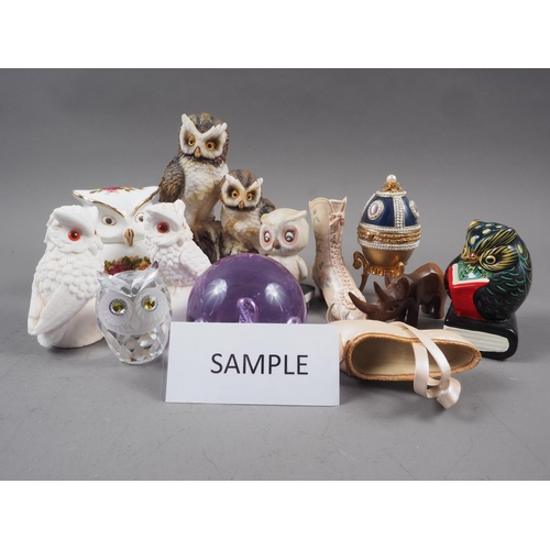 89 - A Swarovski glass owl and a number of ceramic owls, a Caithness blue paperweight and a collection of... 