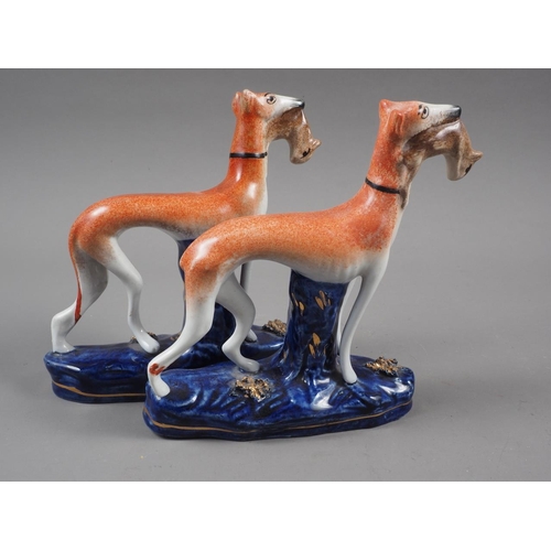 9 - A pair of 19th century Staffordshire greyhounds with rabbits in their mouths, 6